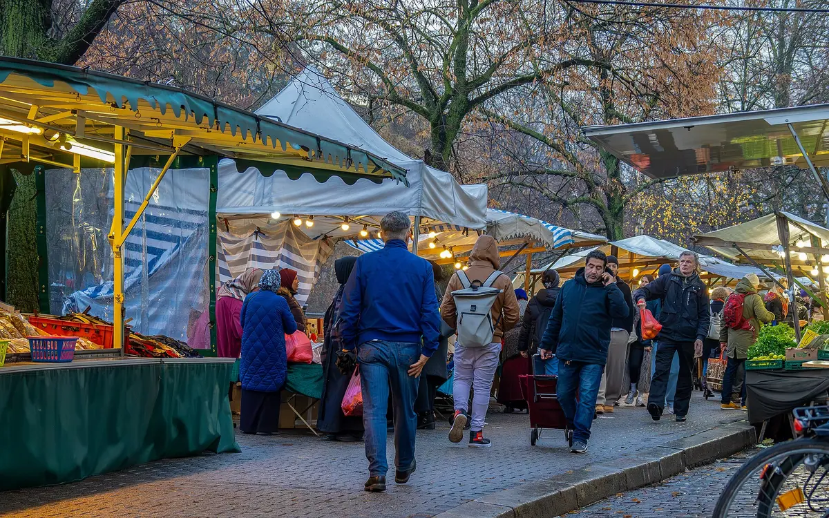 Stalls and shoppers at the Maybachufer market in Berlin