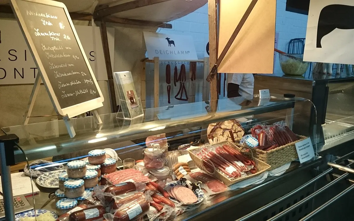Food counter inside Markthalle Neun in Berlin Kreuzberg