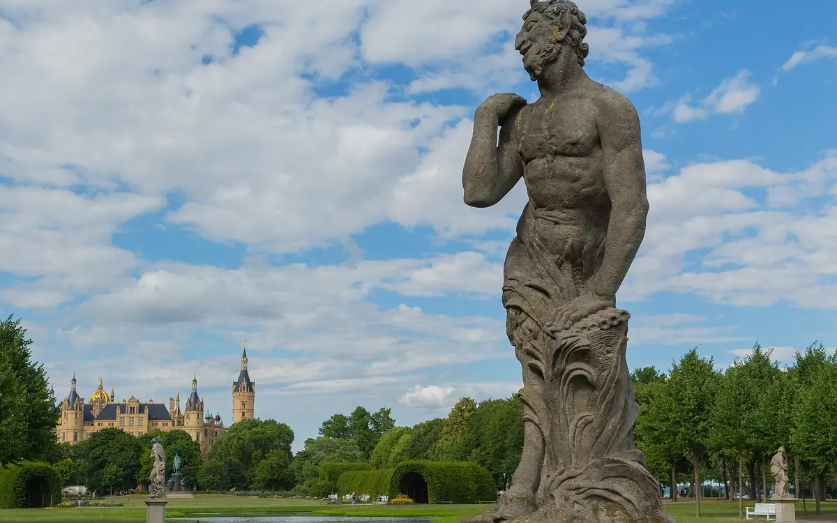 Schwerin palace gardens with lawns and paths beside the palace in Schwerin